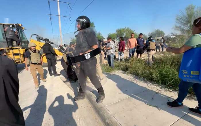 Enfrentamiento entre policías y colonos de asentamiento irregular en Reynosa 2 ppo